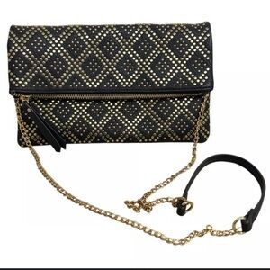 Madison West Stud Accent Fold-Over Clutch Crossbody in black with gold hardware